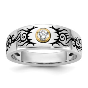 Silver ring with black tribal design.