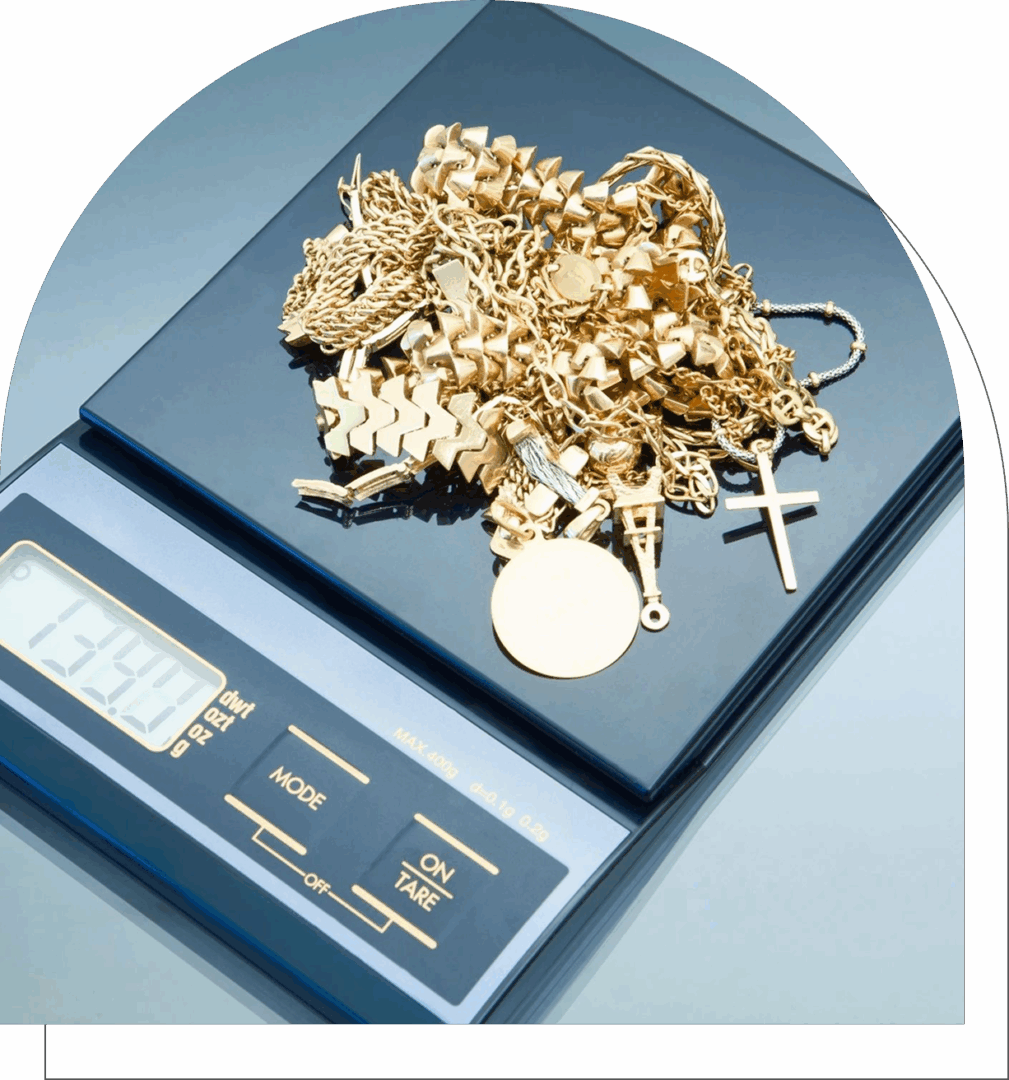 Gold jewelry on digital weighing scale.