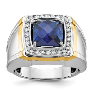 Silver ring with a blue gemstone and diamond accents.