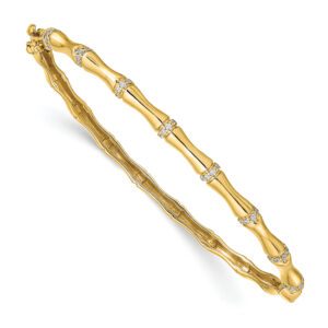 Elegant gold bamboo-inspired bracelet with intricate design.