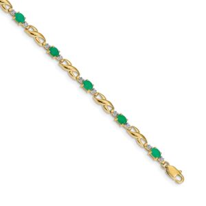 Elegant gold bracelet with green oval gemstones.