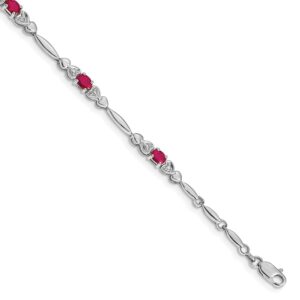 Elegant silver bracelet with red and clear gemstone accents.