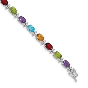 Elegant bracelet with multicolored gemstones in silver settings.