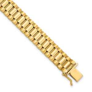 Close-up of a gold metal watch band with a clasp.