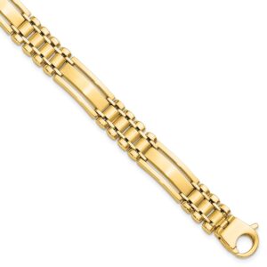 Close-up of a gold bracelet with intricate links and a clasp.
