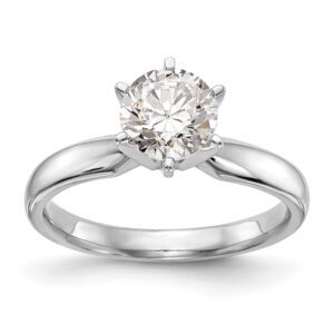 Elegant solitaire diamond engagement ring with a polished silver band.